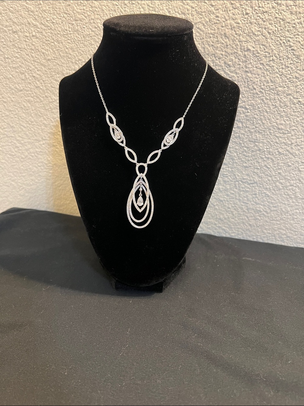 Nadri Elegant Silver-Tone Teardrop Pendant Necklace with Crystal Accents
